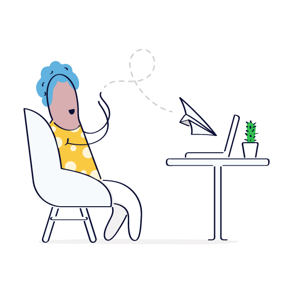 woman sitting in front of a computer and throwing a paper plane
